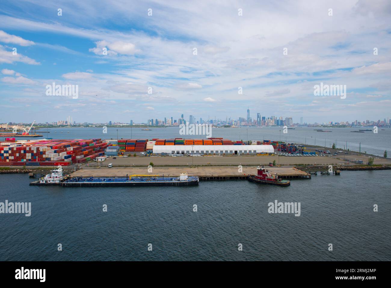 Port Jersey aerial view in city of Bayonne, with NYC Manhattan modern city skyline at the background, New Jersey NJ, USA. Stock Photo