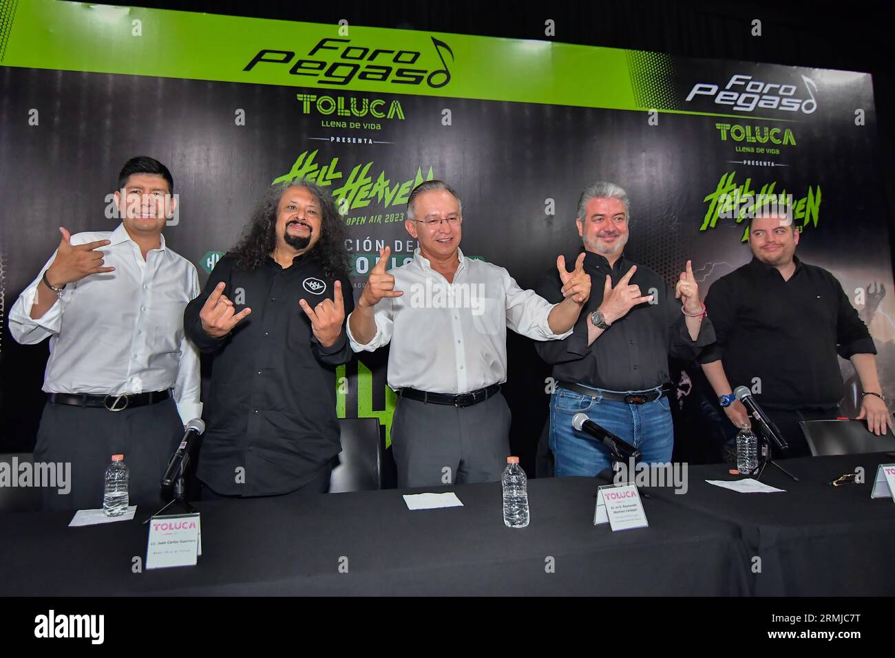 August 24, 2023 Toluca, Mexico : Juan Carlos Guerrero, Official Spokesperson for Hell and Heaven Festival, Raymundo Martinez Carbajal, Mayor of Toluca, Luis Manuel Garcia Aguilar, General Director of Centro Dinamico Pegaso, during a press conference where they officially presented the poster for the Hell and Heaven Open Air 2023 music festival, which will take place at the Pegaso Dynamic Center in the city of Toluca from November 3 to 5, 2023. on August 24, 2023 in Toluca, Mexico. (Photo by Arturo Hernandez/Eyepix Group) (Photo by Eyepix/NurPhoto) Stock Photo