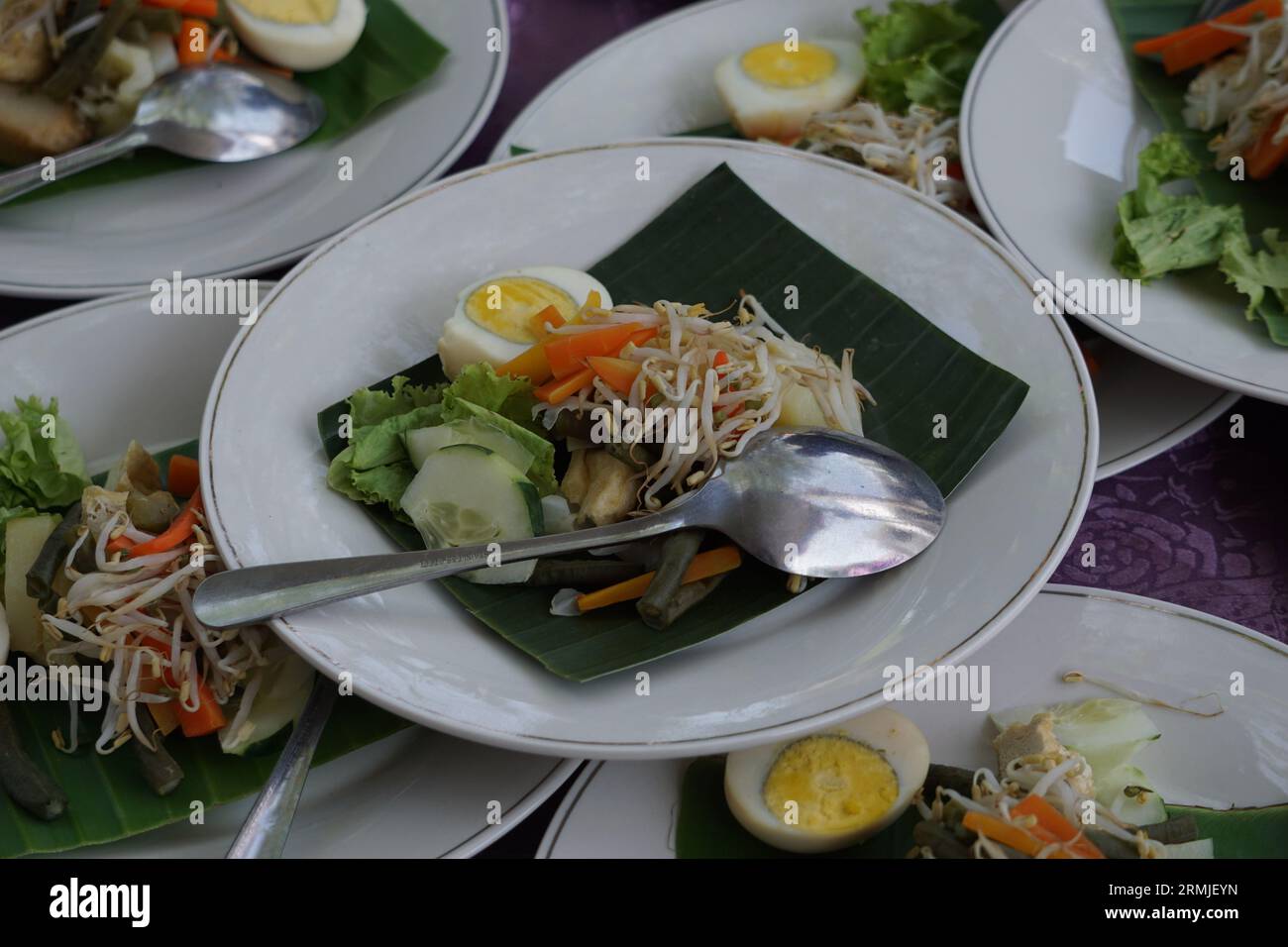 Gadogado is a typical Indonesian food containing boiled vegetables