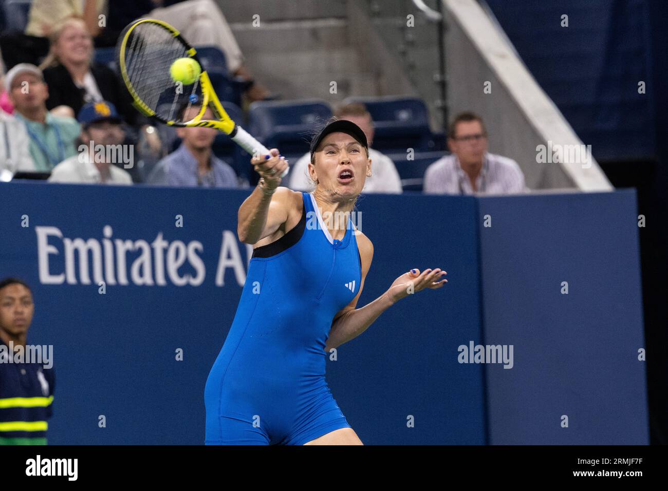 Caroline Wozniacki of Denmark returns ball during match against Tatiana Prozorova at US Open Championships at Billie Jean King Tennis Center in New York on August 28, 2023 Stock Photo