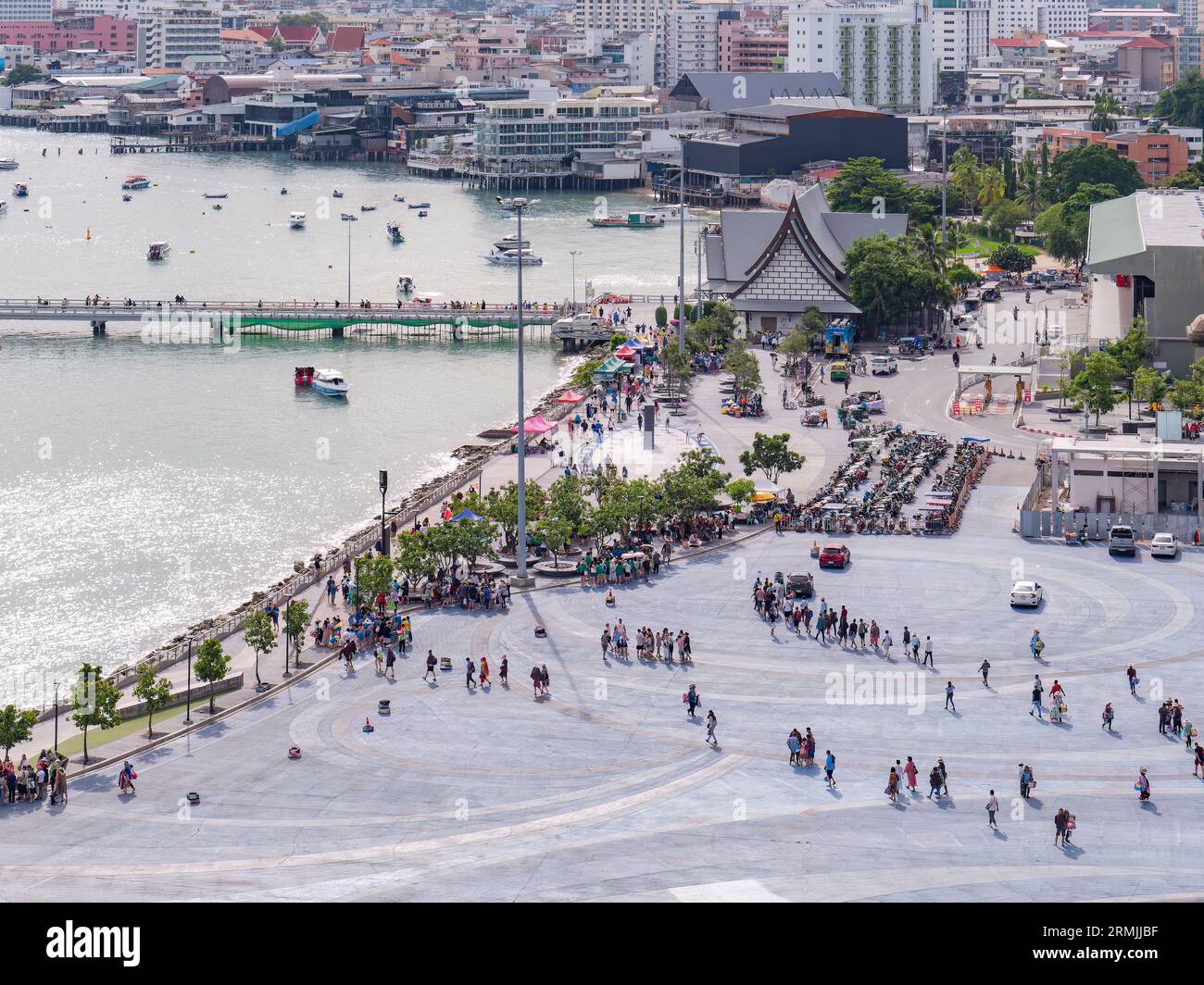 Pattaya, Thailand - August 22nd 2023: Tourists arriving at Bali Hai Pier in Pattaya to travel on boats to Koh Lan, an island off the coast of Pattaya. Stock Photo