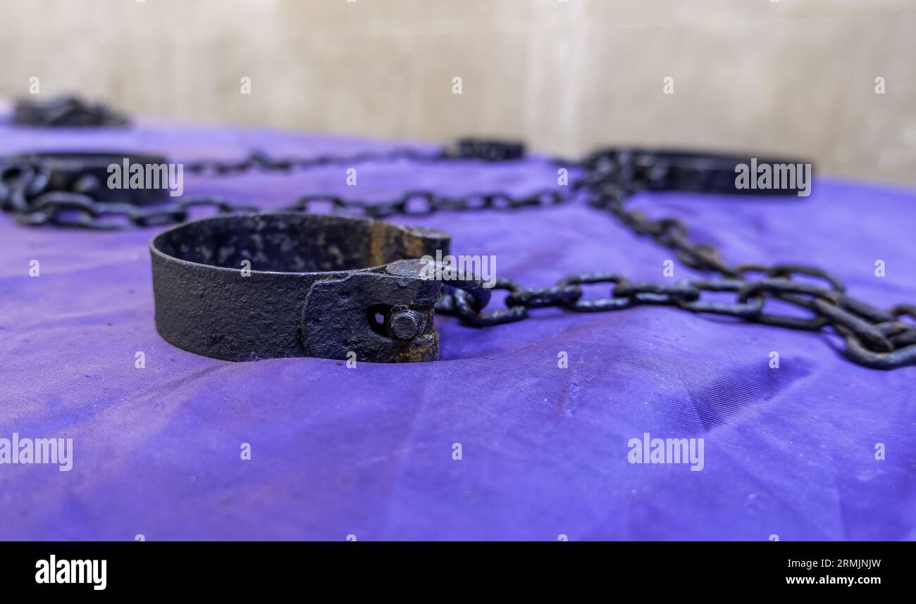 Iron handcuffs with chains, medieval torture, inquisition Stock Photo Alamy