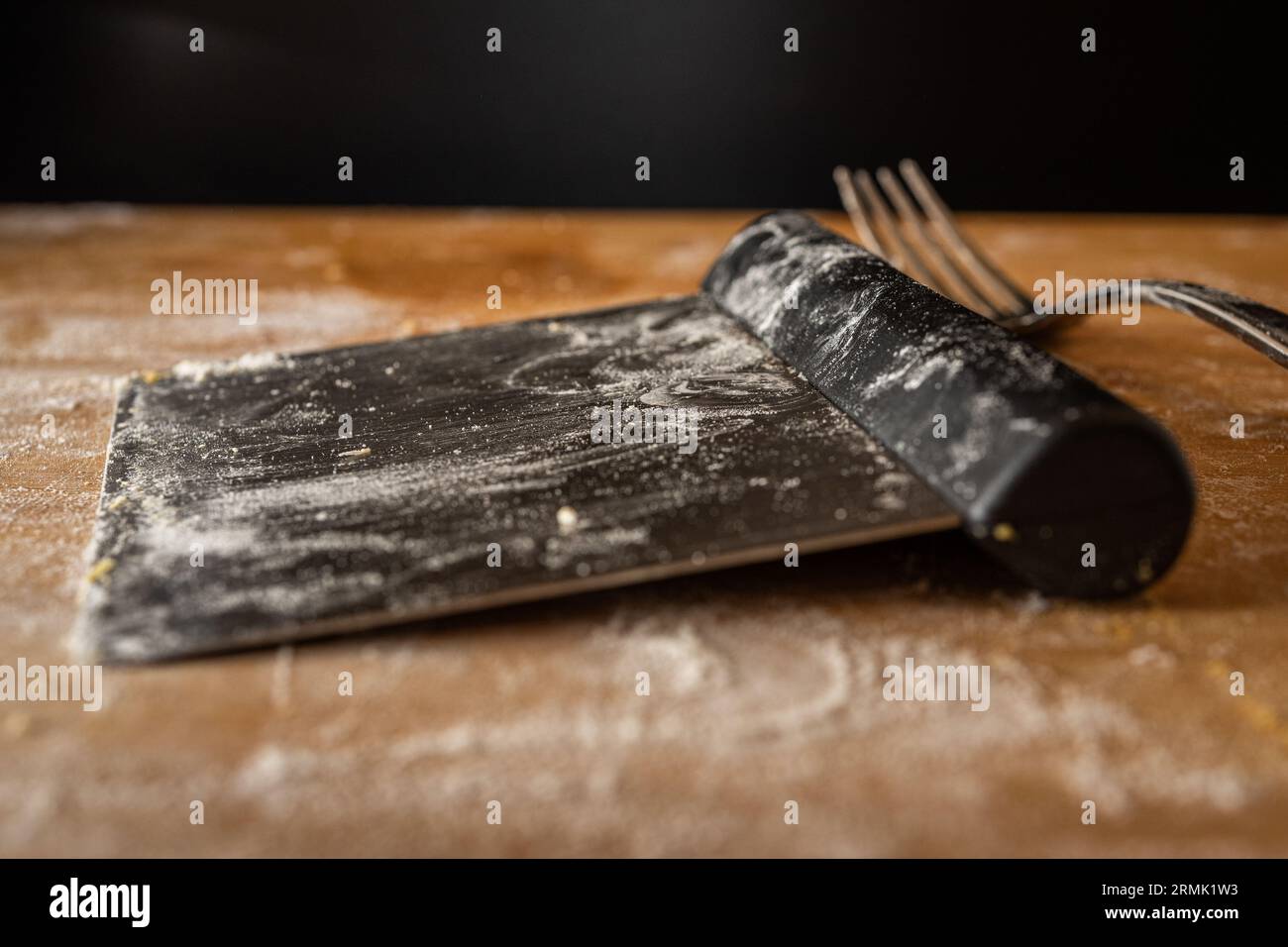 Pastry Cutter On Floured Work Surface WIth Fork Preparing Squash