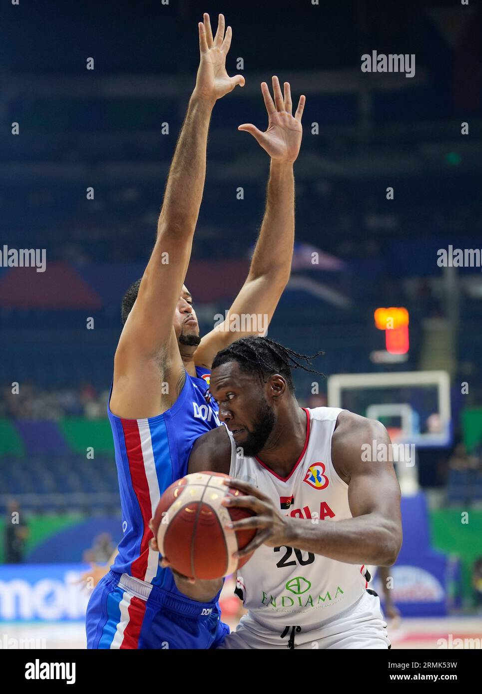 Angola center Bruno Fernando (20) against Dominican Republic center ...