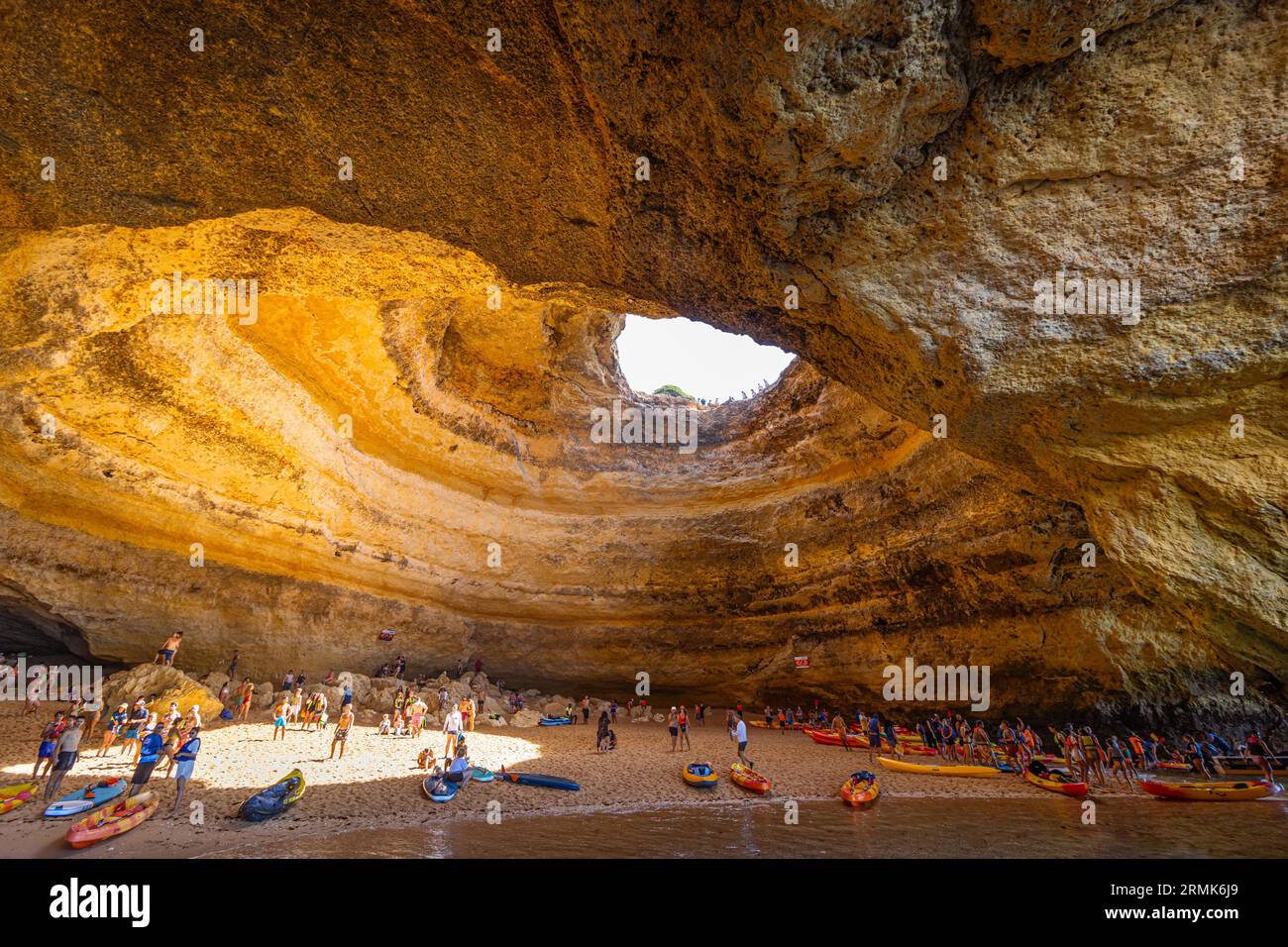 The world-famous Benagil Cave is only accessible from the sea and can be used at low tide. Numerous tourists from all over the world crowd into the Stock Photo