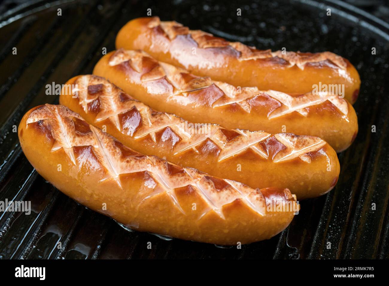 Symbolic image, Unhealthy food, Grilled sausages on a griddle, Baden