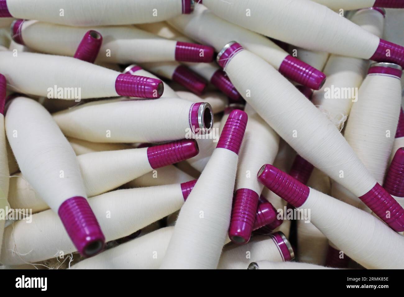 Cotton yarn is piled up in a spinning mill Stock Photo - Alamy