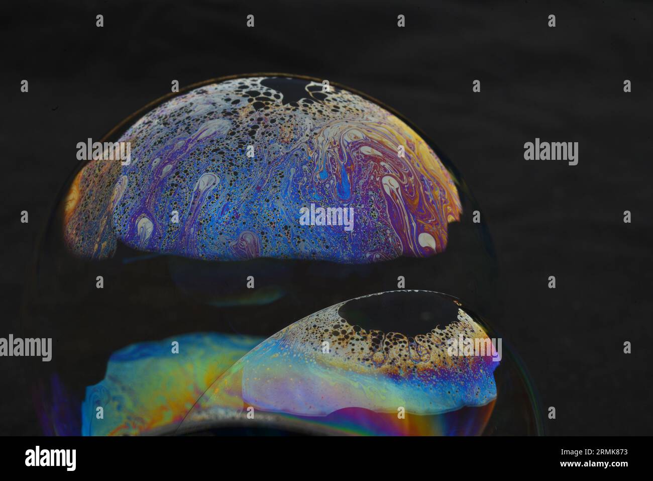Beautiful psychedelic abstractions on the surface soap bubbles Stock Photo