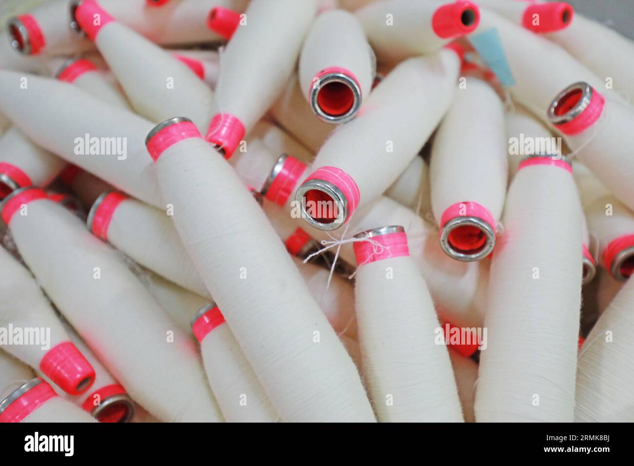 Cotton yarn is piled up in a spinning mill Stock Photo - Alamy