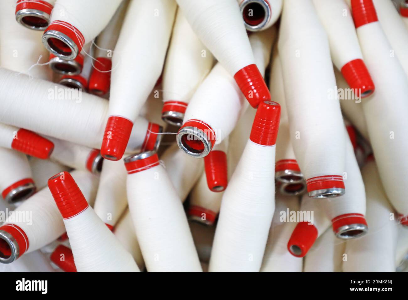 Cotton yarn is piled up in a spinning mill Stock Photo - Alamy