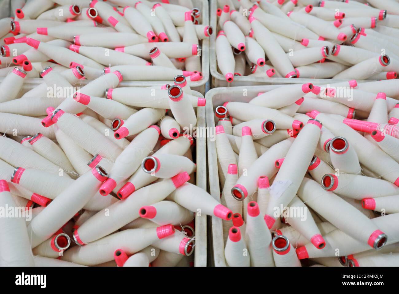 Cotton yarn is piled up in a spinning mill Stock Photo - Alamy