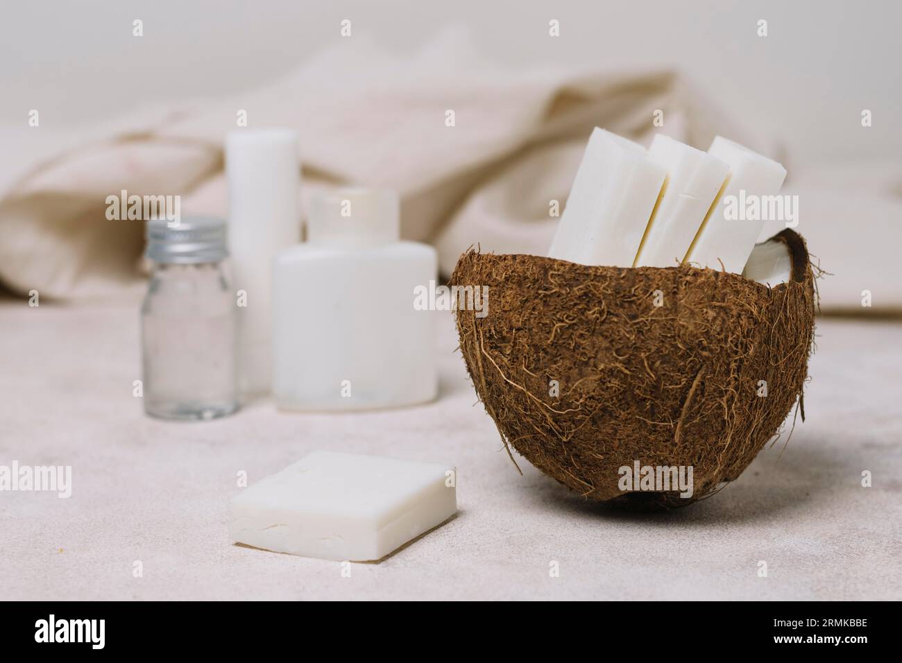 Coconut soap bars coconut bowl with oils Stock Photo Alamy