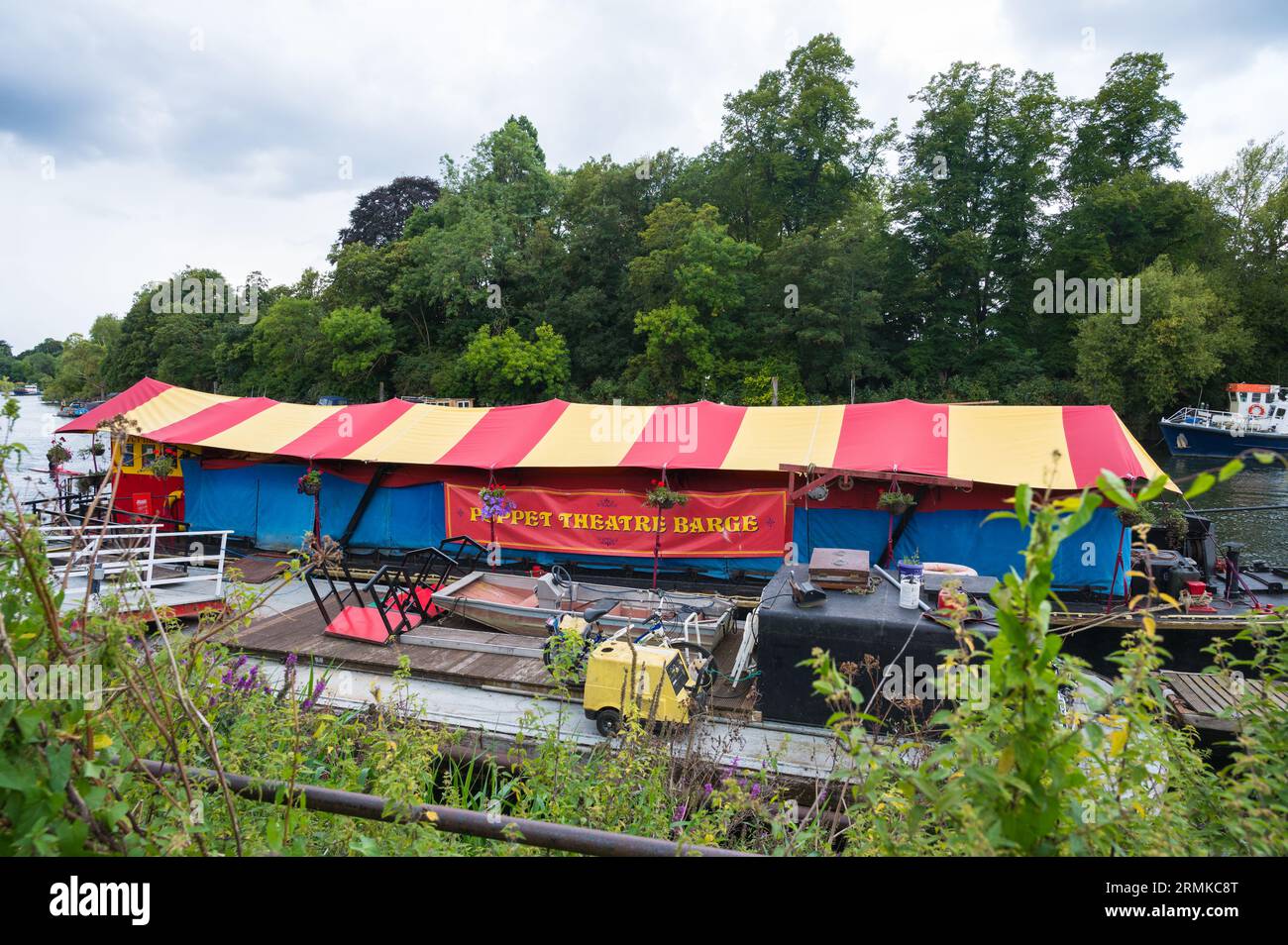 Pictured on the Thames at Richmond, Puppet Theatre Barge is an itinerant floating puppet theatre managed and run by charity Art of the Puppet. London Stock Photo