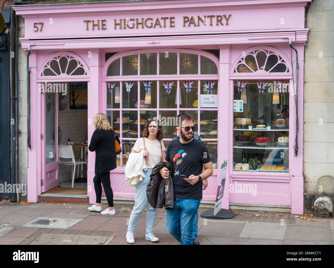 People pass by The Highgate Pantry bakery shop on Highgate High Street, Highgate Village, London, England, UK Stock Photo