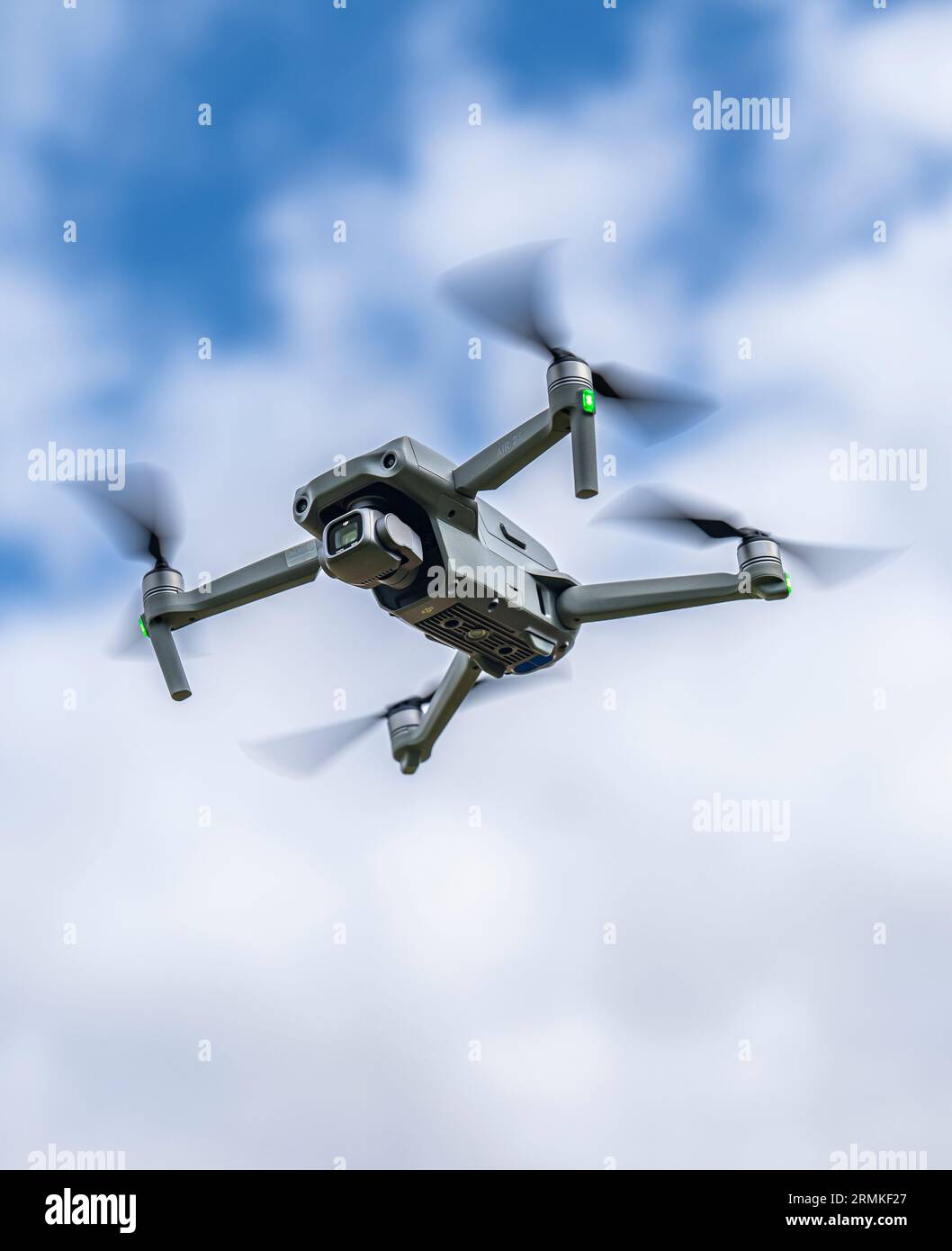 A DJI Air 2S Drone in flight against the sky Stock Photo