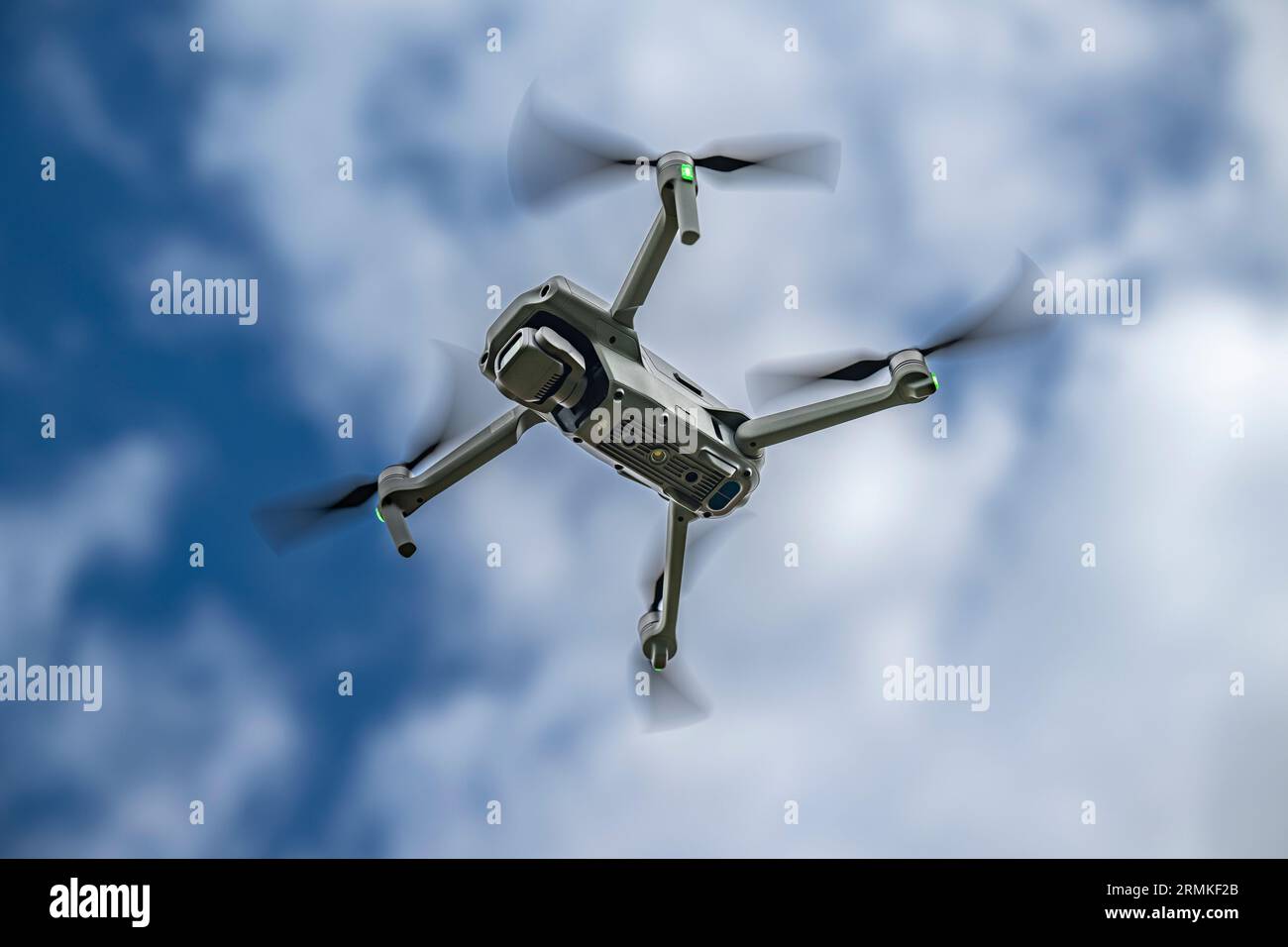 A DJI Air 2S Drone in flight against the sky Stock Photo