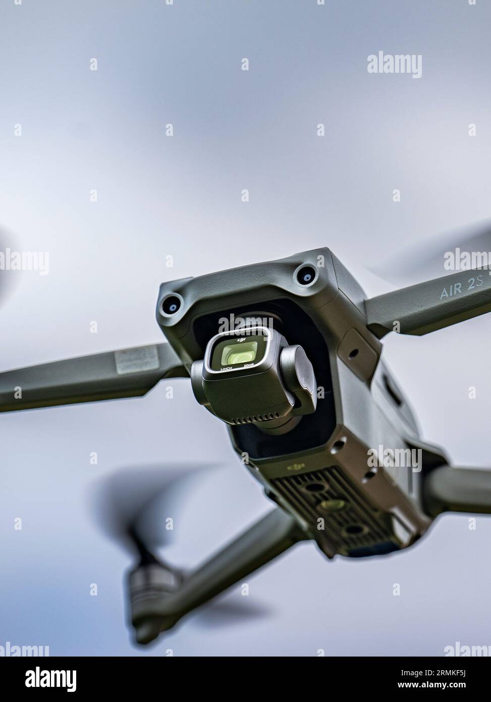 A DJI Air 2S Drone in flight against the sky Stock Photo