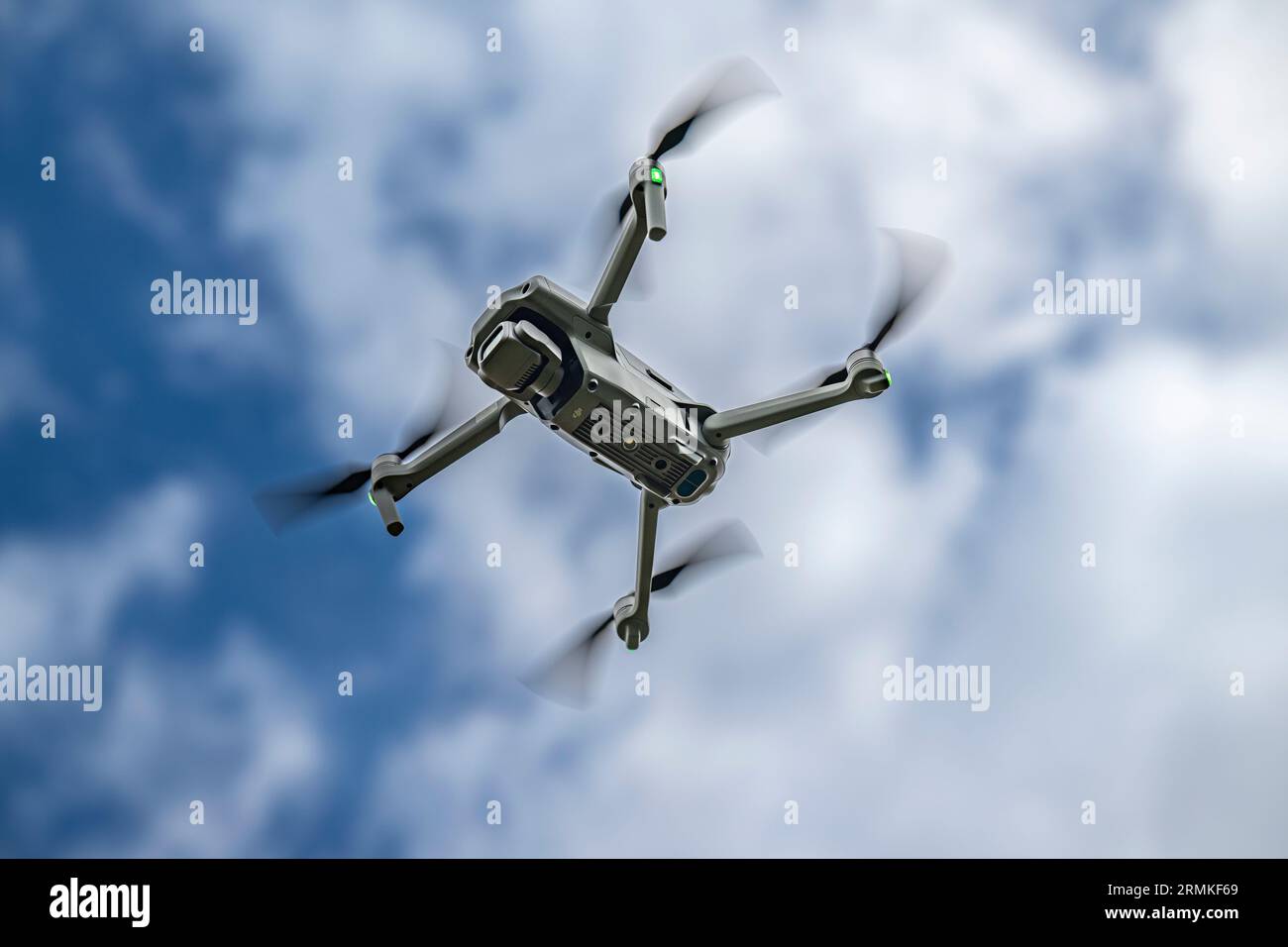 A DJI Air 2S Drone in flight against the sky Stock Photo