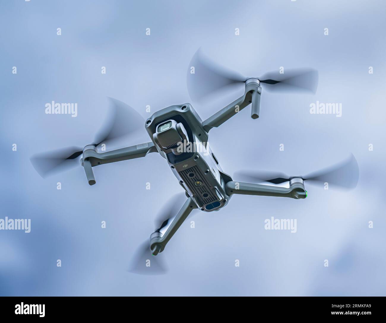 A DJI Air 2S Drone in flight against the sky Stock Photo