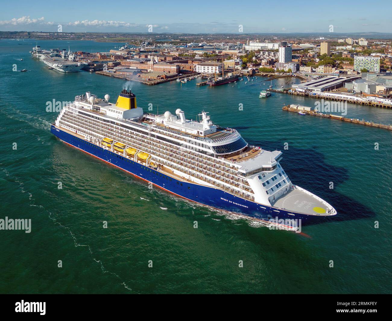 Aerial views of Saga Cruises' Spirit of Discovery cruise ship departing Portsmouth Harbour. Stock Photo