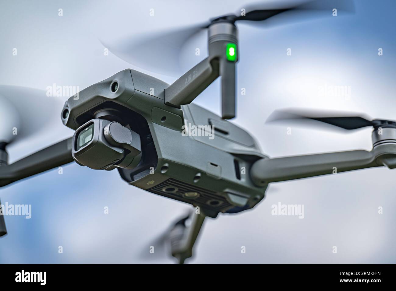 A DJI Air 2S Drone in flight against the sky Stock Photo