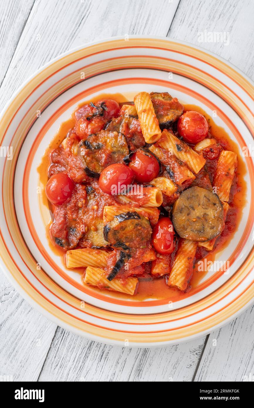 Pasta Alla Norma with eggplants, tomato sauce and ricotta Stock Photo
