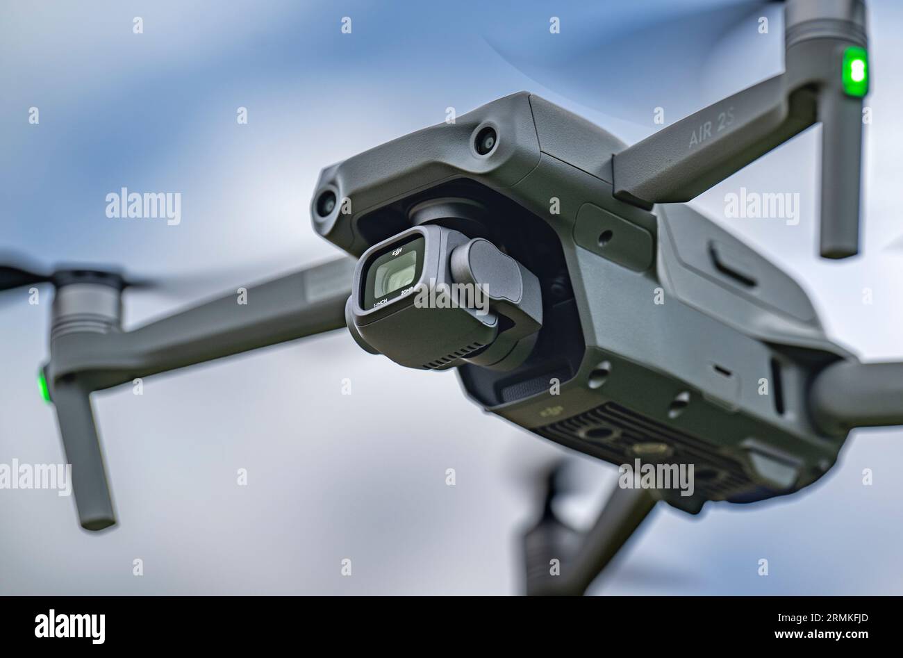 A DJI Air 2S Drone in flight against the sky Stock Photo