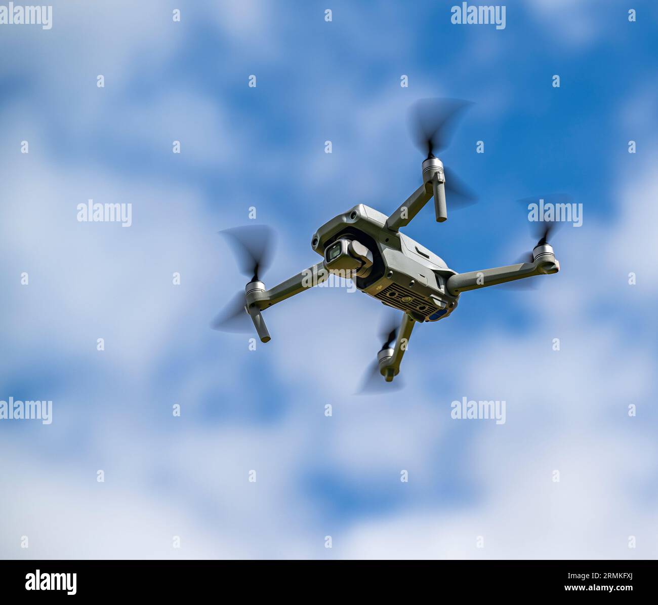 A DJI Air 2S Drone in flight against the sky Stock Photo