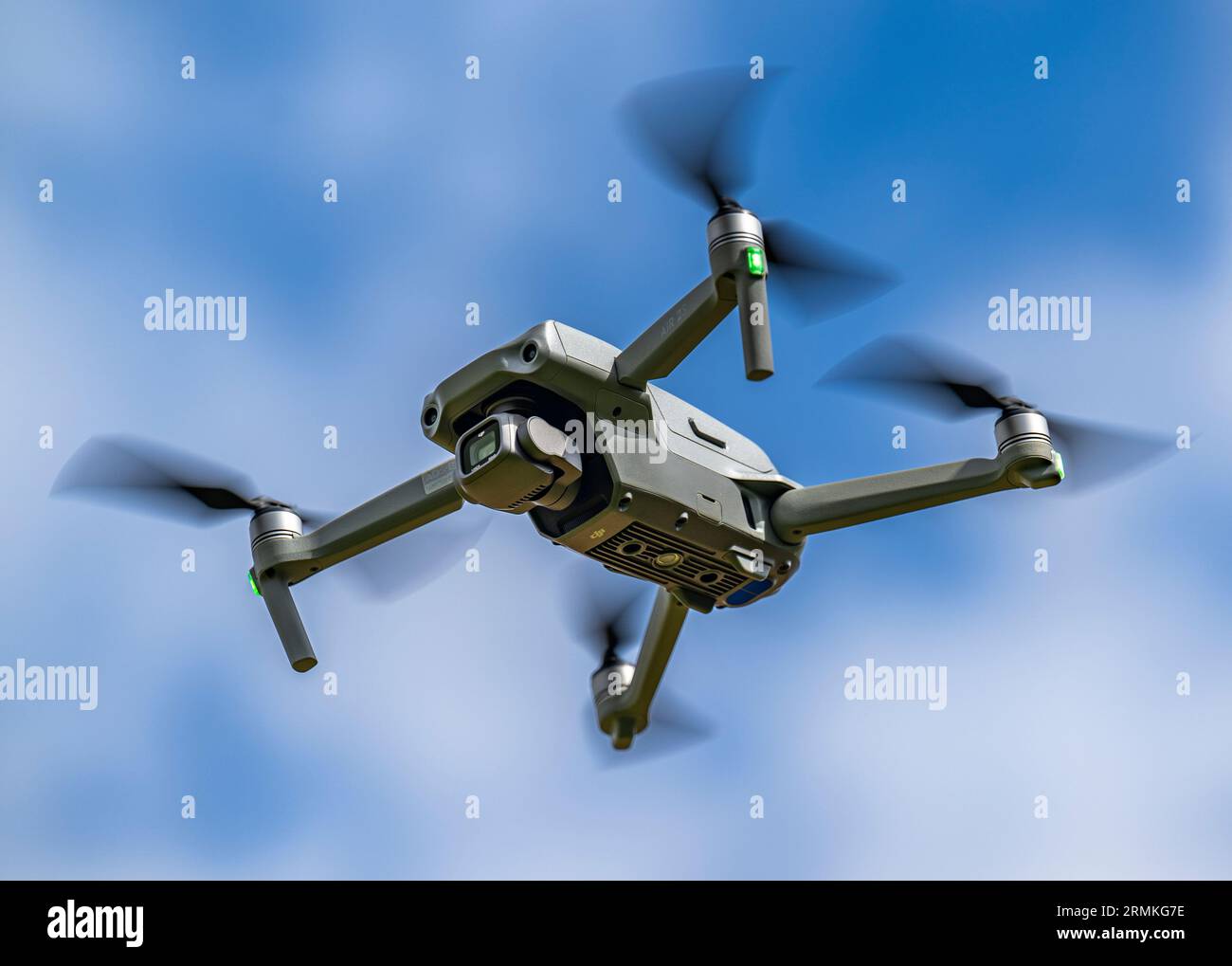 A DJI Air 2S Drone in flight against the sky Stock Photo