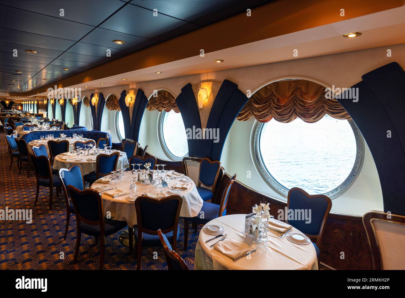 Luxury restaurant on a cruise ship that hosts dinners and entertainment events. Stock Photo