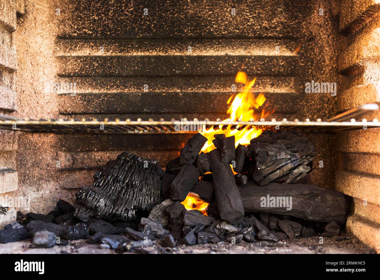 Empty bbq grill pit with hot charcoal briquettes Stock Photo Alamy