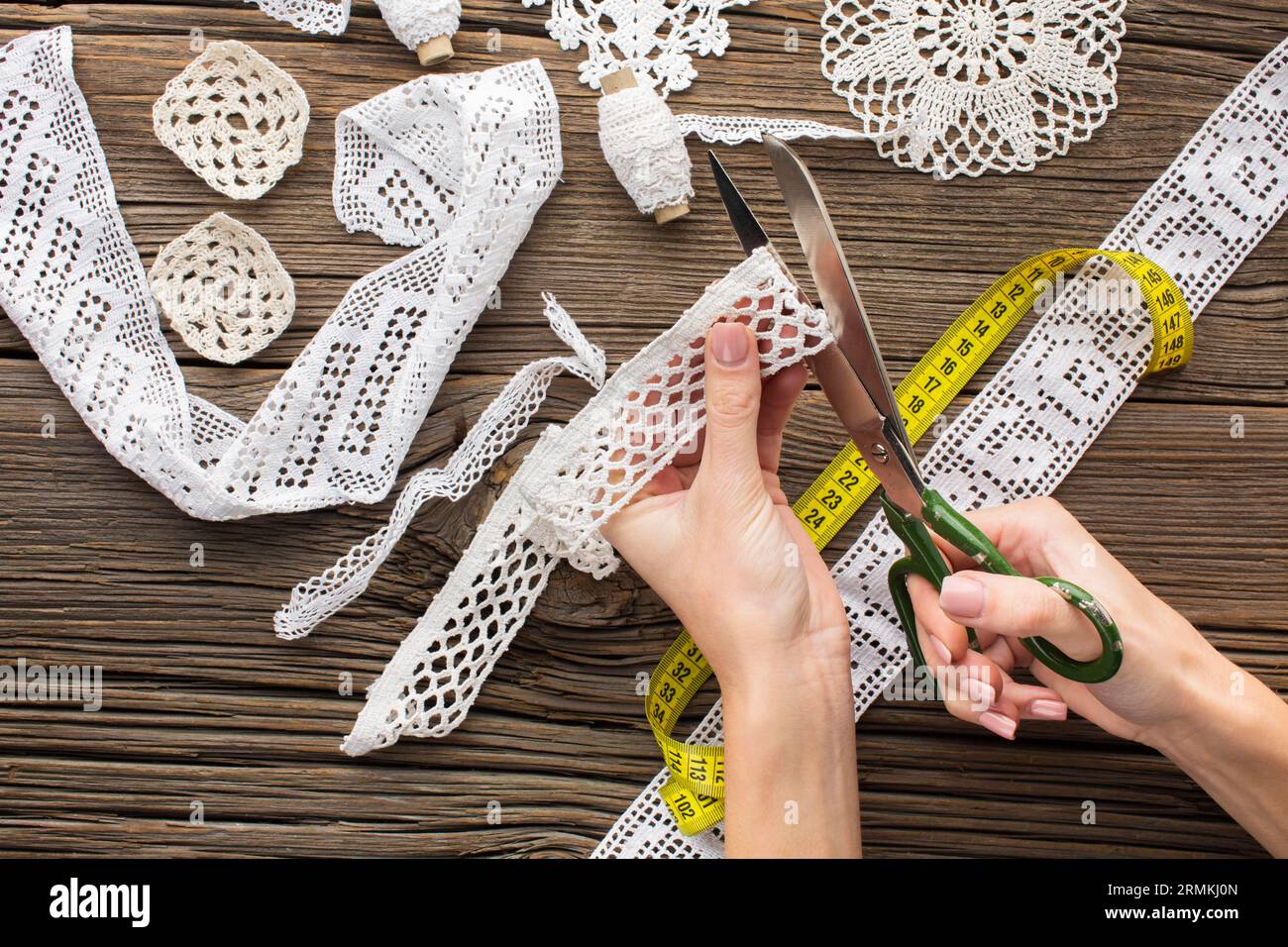 Hands cutting laces top view Stock Photo Alamy