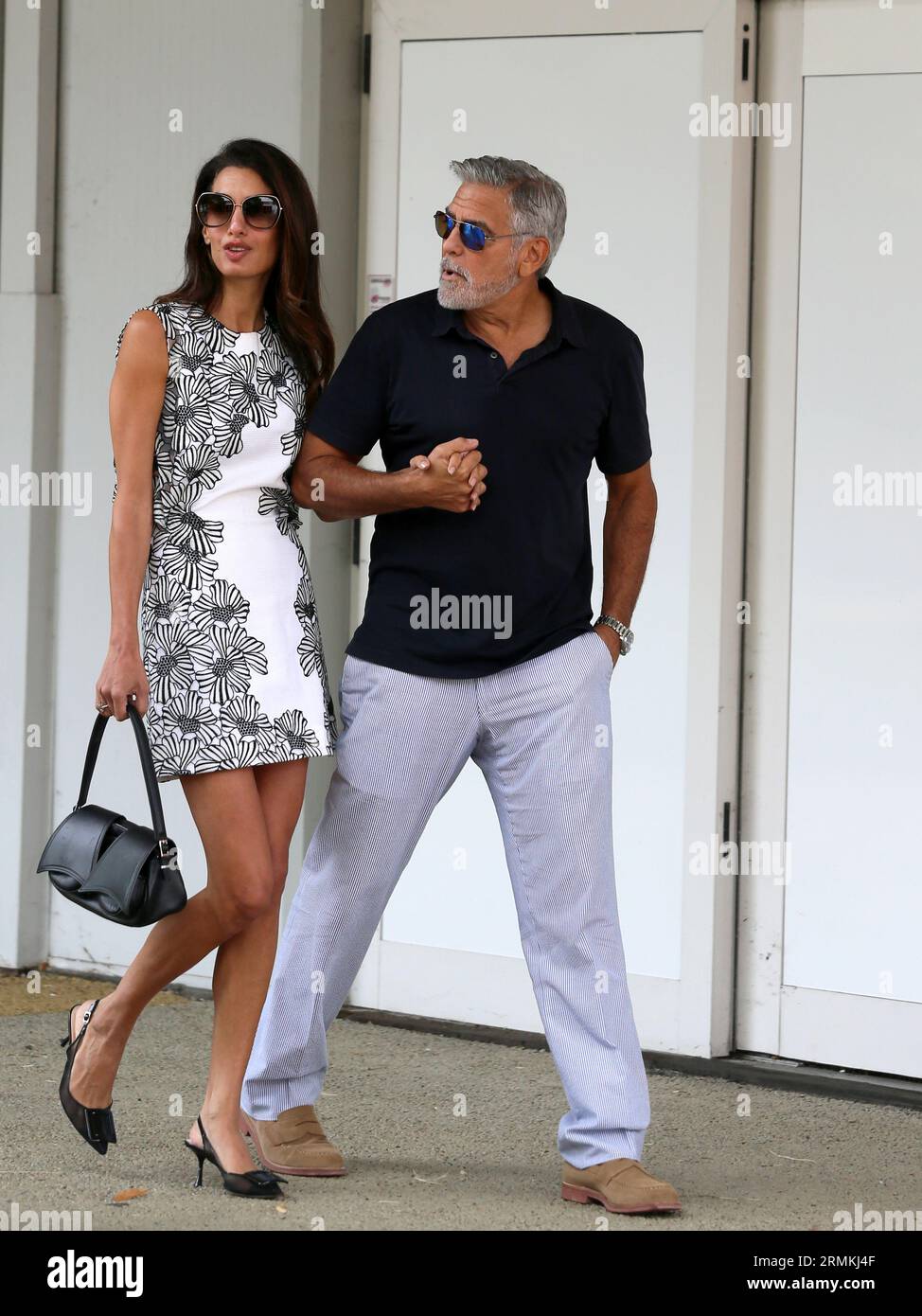 Venice, . 29th Aug, 2023. Venice, 80th Venice Film Festival 2023, George Clooney and Amal arrive at the airport Credit: Independent Photo Agency/Alamy Live News Stock Photo