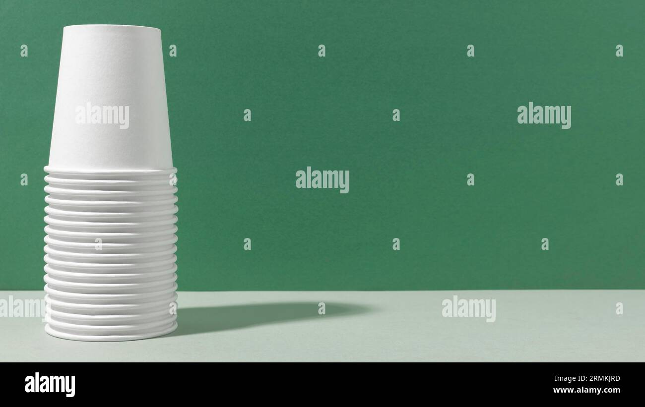 Pile upside down cups copy space Stock Photo - Alamy