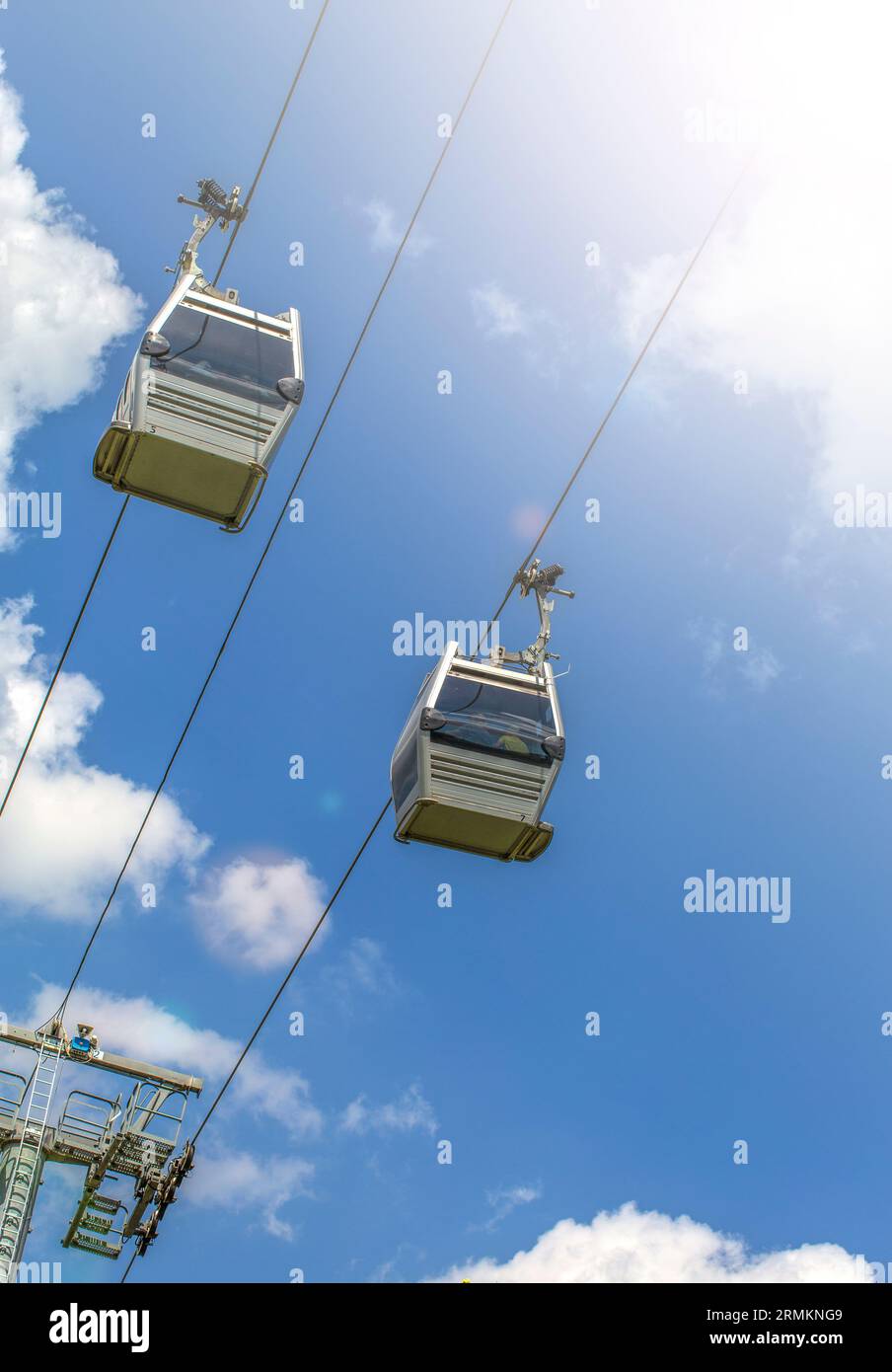 The Cable car cabins against blue sky and clouds. Georgia Stock Photo ...