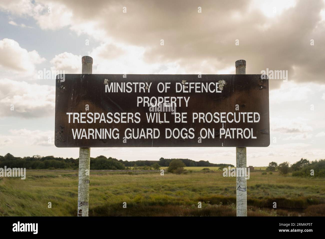 Metal sign, Ministry of Defence Property, Trespassers will be Prosecuted, Warning Guard Dogs on Patrol Stock Photo