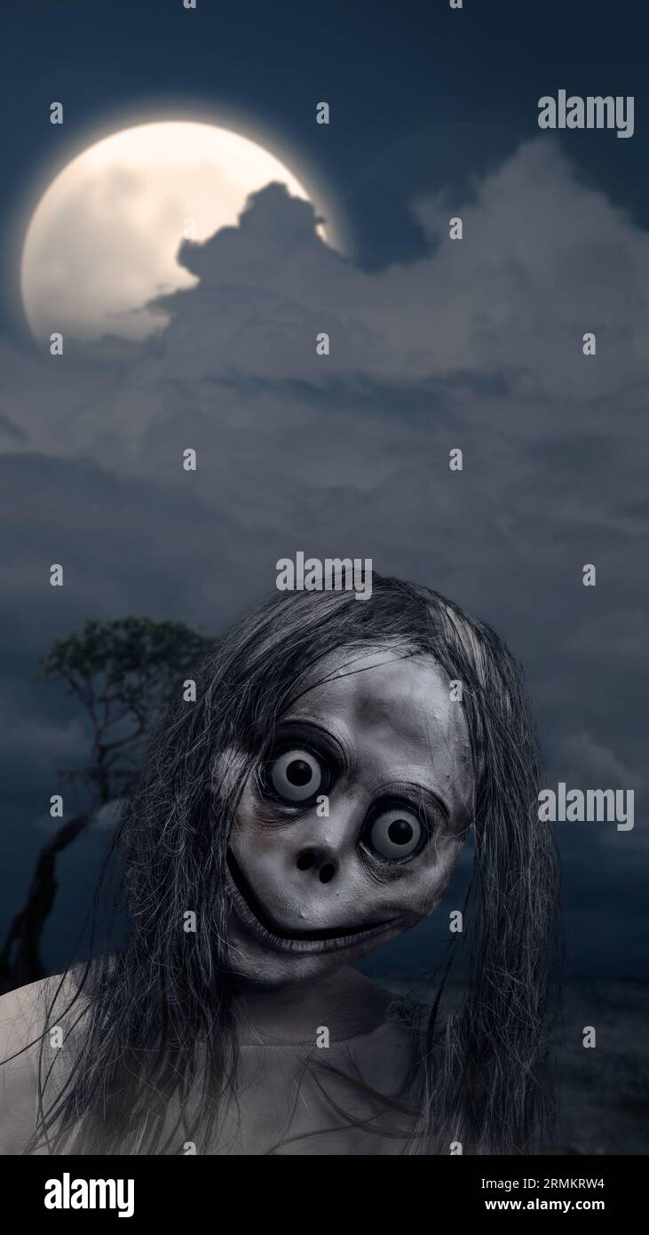 Scary Momo standing behind the wall in the dark background. Scary face for  Halloween. Halloween concept Stock Photo - Alamy