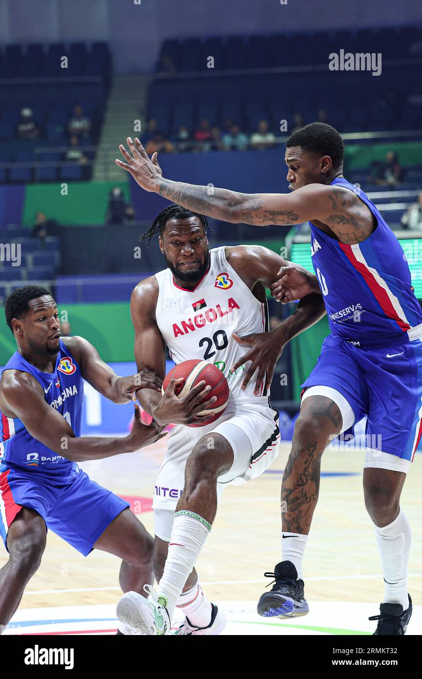 Manila, Philippines. 29th Aug, 2023. Angola's Bruno Fernando (C) breaks through during the Group A match between Angola and Dominican Republic at the 2023 FIBA World Cup in Manila, the Philippines, Aug. 29, 2023. Credit: Wu Zhuang/Xinhua/Alamy Live News Stock Photo