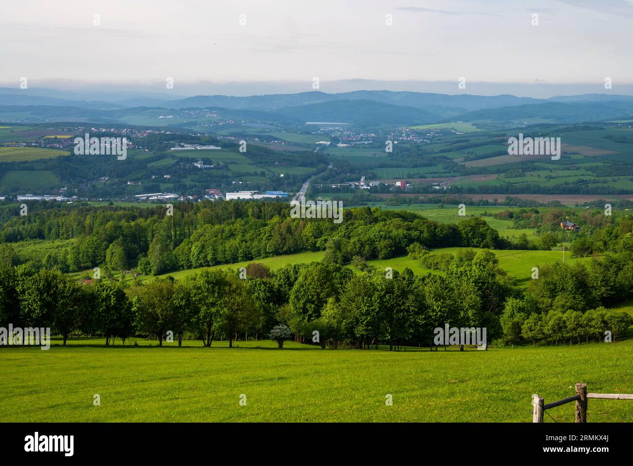 Green hilly landscape, woods, meadows and village, Lipa near Zlin, Czech republic. Springtime. Stock Photo