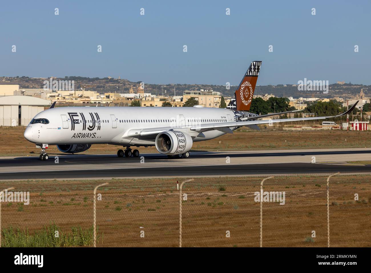 Fiji Airways Airbus A350-941 (REG: DQ-FAN) departing to enter service after being serviced at LTM. Stock Photo