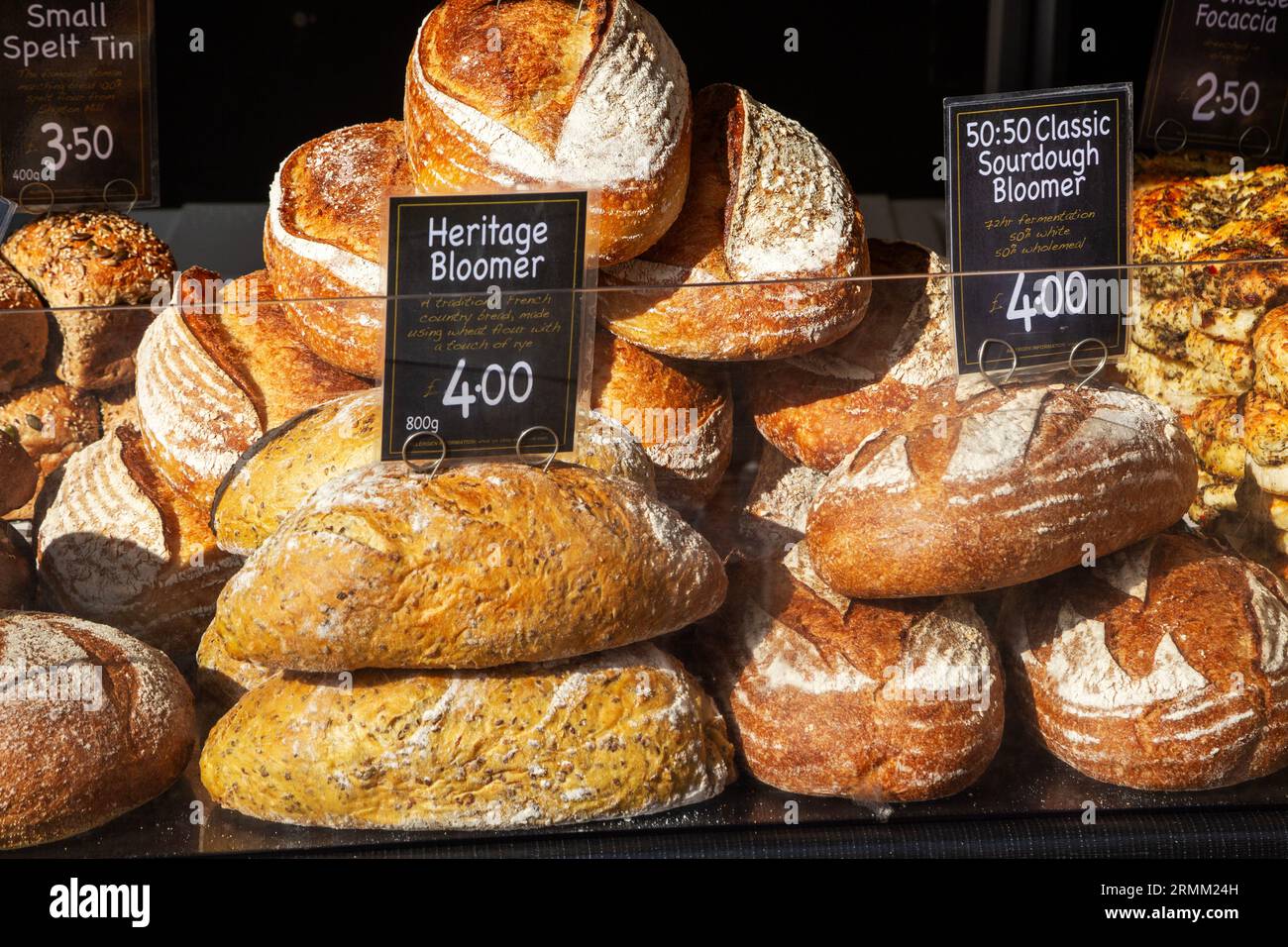 Fresh loaves of artisan bread on sale at street market stall
