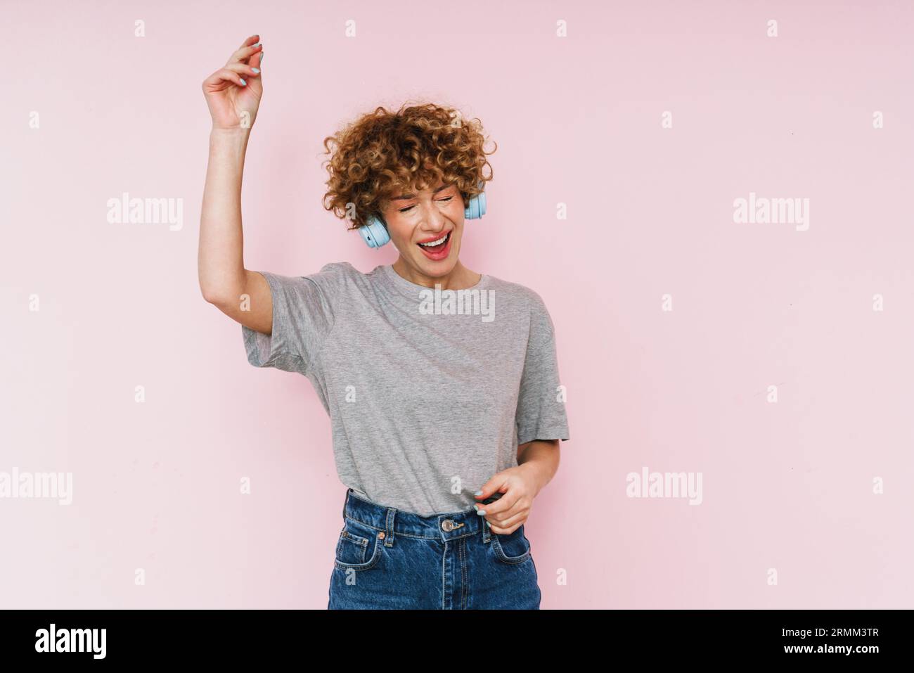 Mature woman dancing listening hi-res stock photography and images - Alamy
