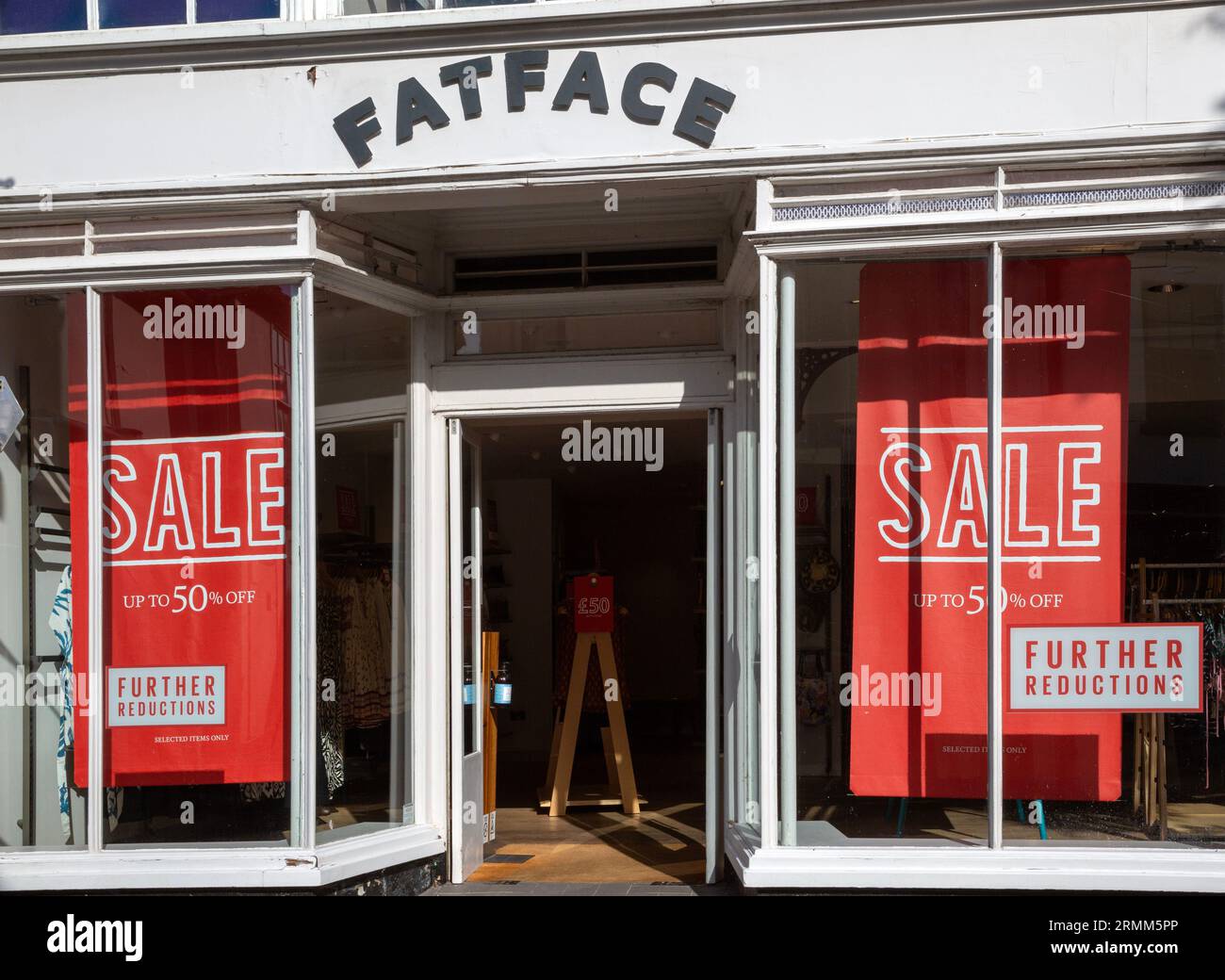 Sale posters in FatFace clothing store shop, Woodbridge, Sufffolk, England, Uk Stock Photo
