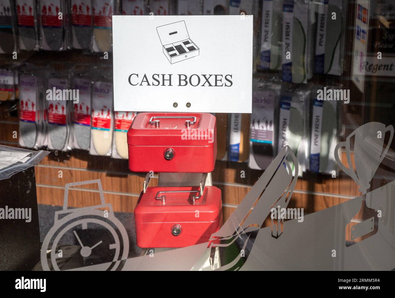 Display of Cash Boxes on sale in hardware shop window, Woodbridge