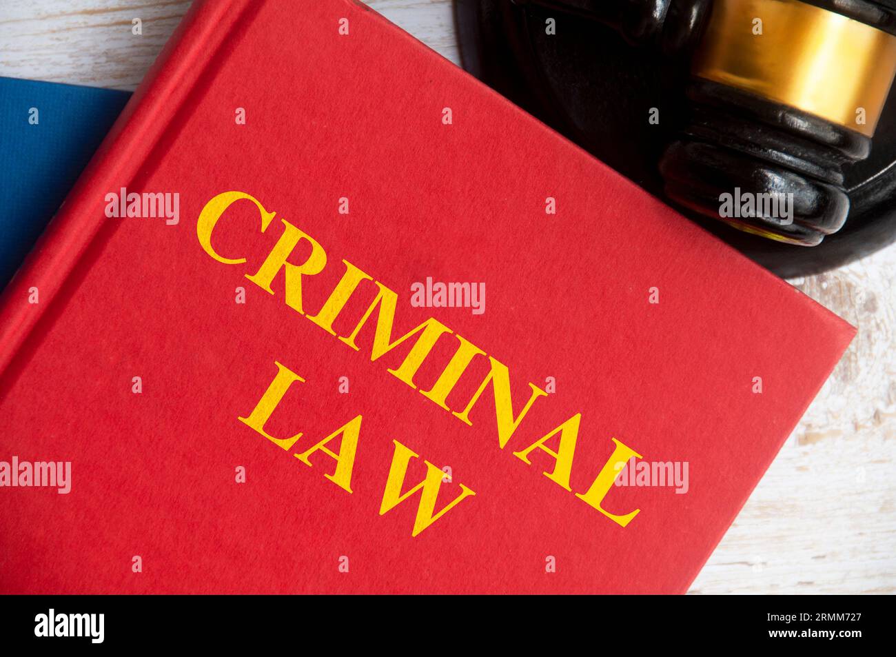 Top view of Criminal law book with gavel on white background. Probate law concept. Stock Photo