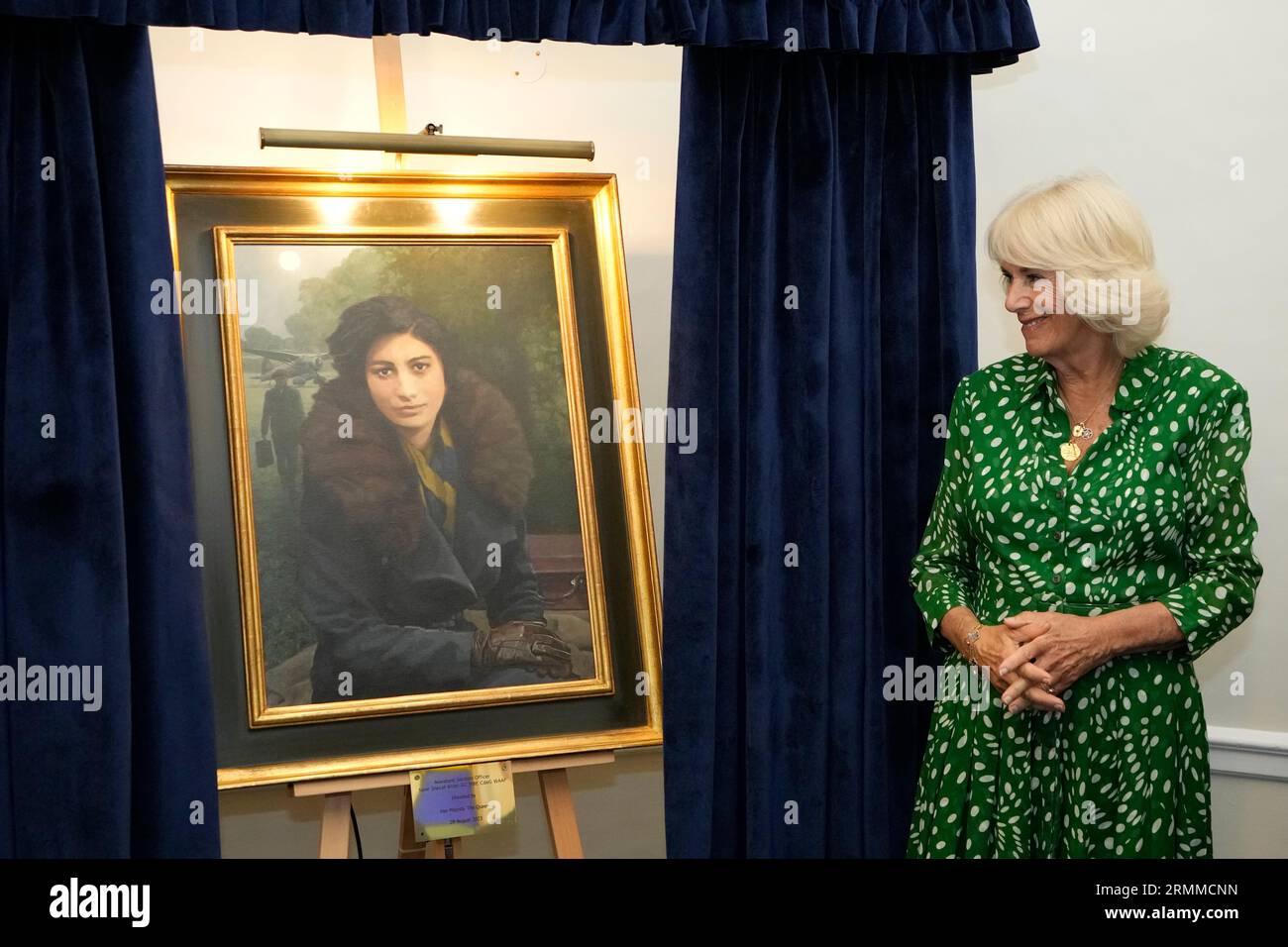 Queen Camilla unveils a portrait of Special Operations Executive (SOE) Operative, Noor-un-Nisa Inayat Khan GC, and formally announces the naming of a room in her honour at the Royal Air Force Club in Piccadilly, central London. Picture date: Tuesday August 29, 2023. Stock Photo