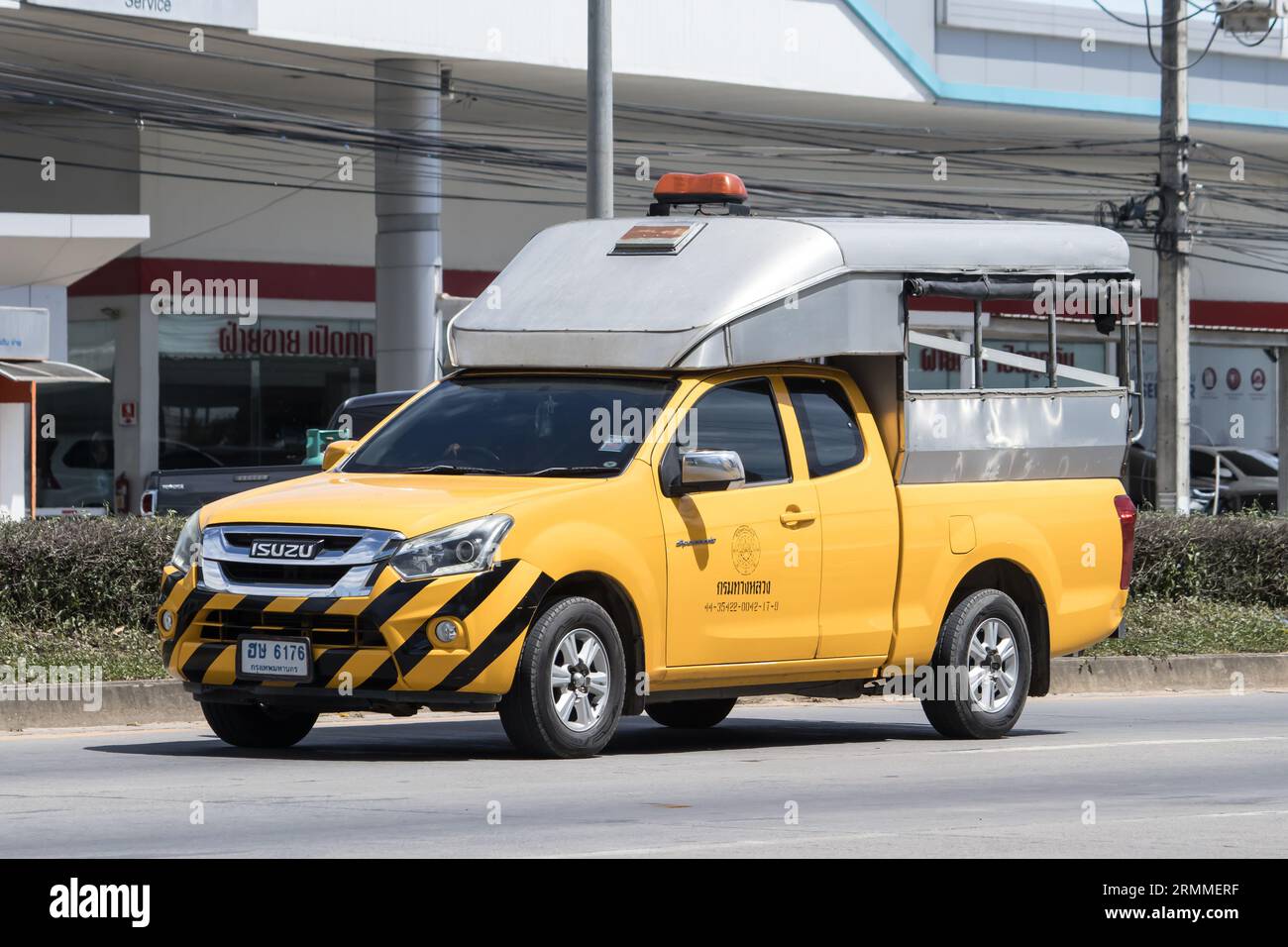 Chiangmai, Thailand -  July  14 2023: Pickup truck of Department of Highways. Photo at road no.1001 about 8 km from downtown Chiangmai, thailand. Stock Photo