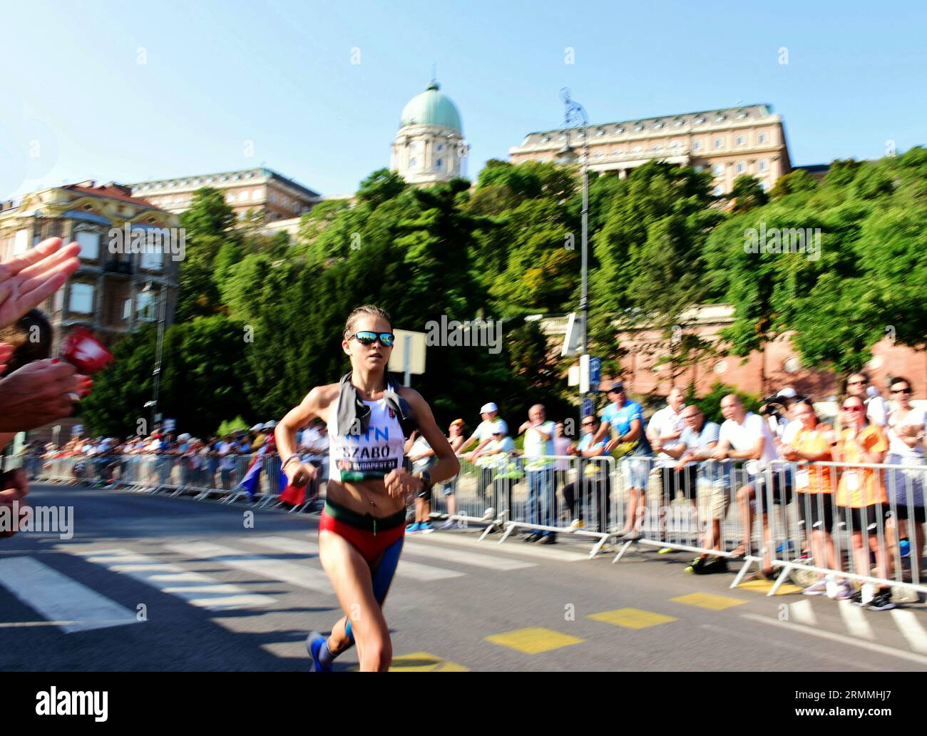 female runner at the World Athletics Championships Marathon run event on urban street in Budapest on Aug. 26th.. sports, competition, active lifestyle Stock Photo