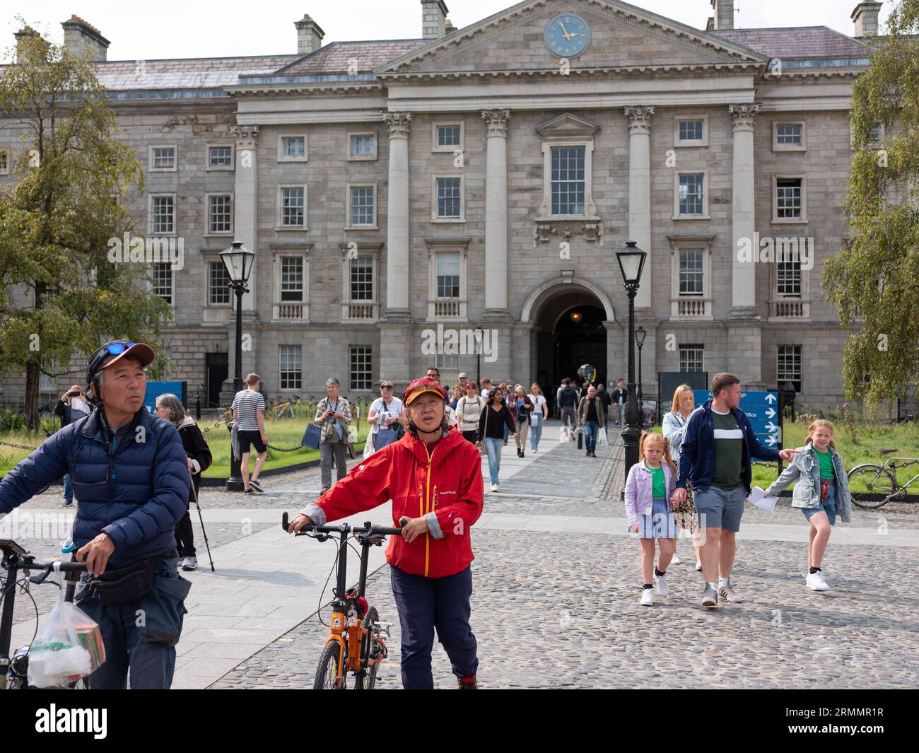 Tourists visiting Trinity College in Dublin city, Ireland Stock Photo