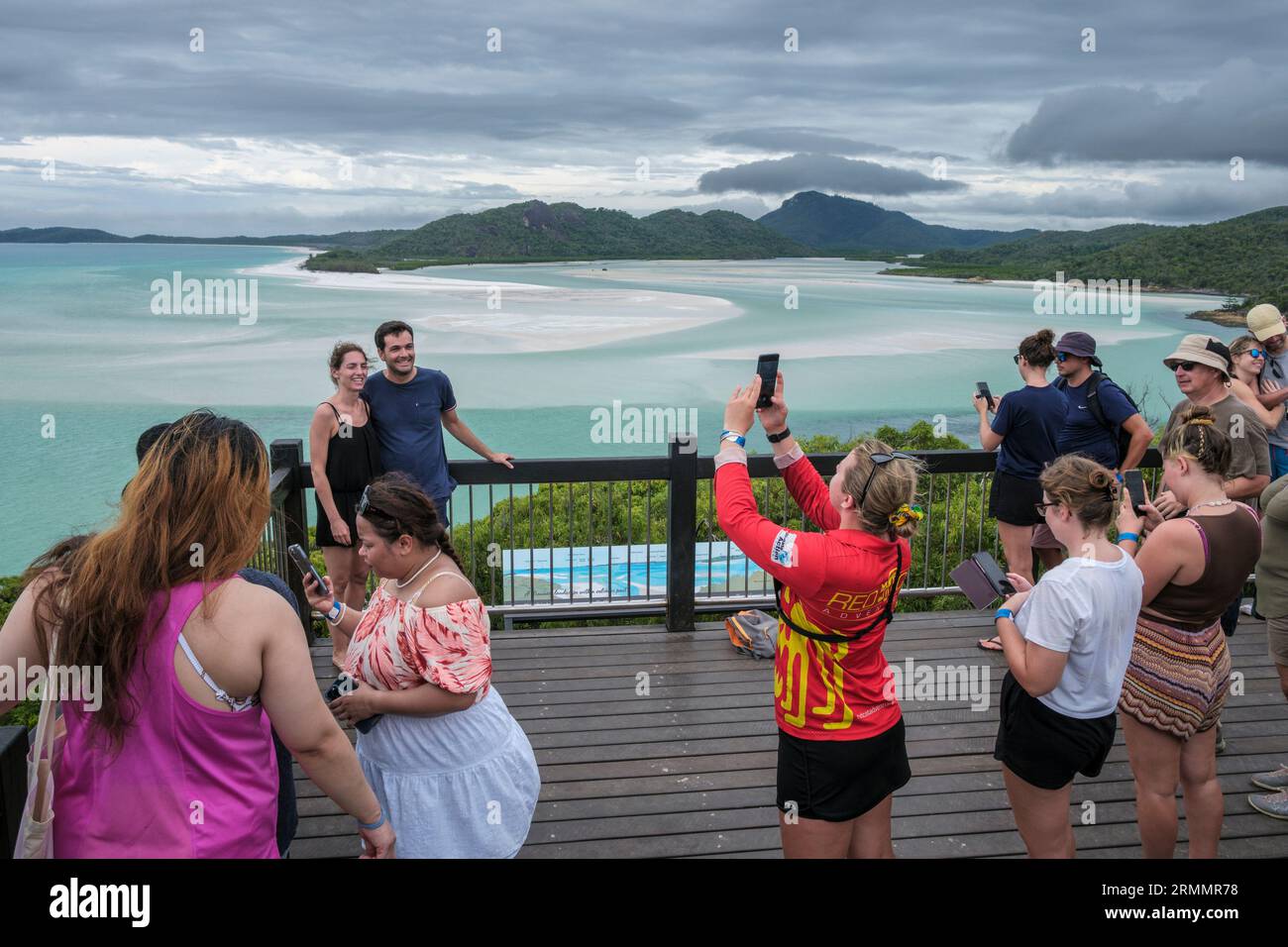 Tourists taking photographs on the lookout at Whitehaven Beach, Whitsunday Island, Queensland, Australia Stock Photo